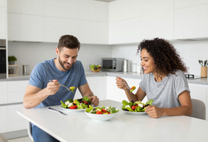 Adults enjoying a balanced meal, showing the connection between nutrition and energy, mood, and wellbeing