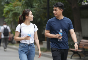 Person walking after a meal to aid digestion and reduce bloating after overeating