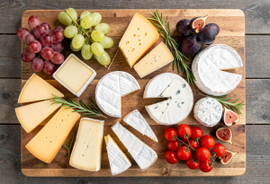healthy cheese board with fruits and vegetables