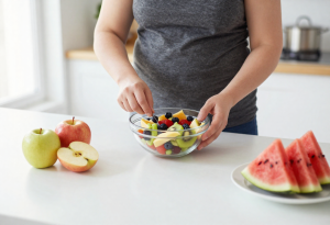 Preparing a healthy fruit salad for weight loss